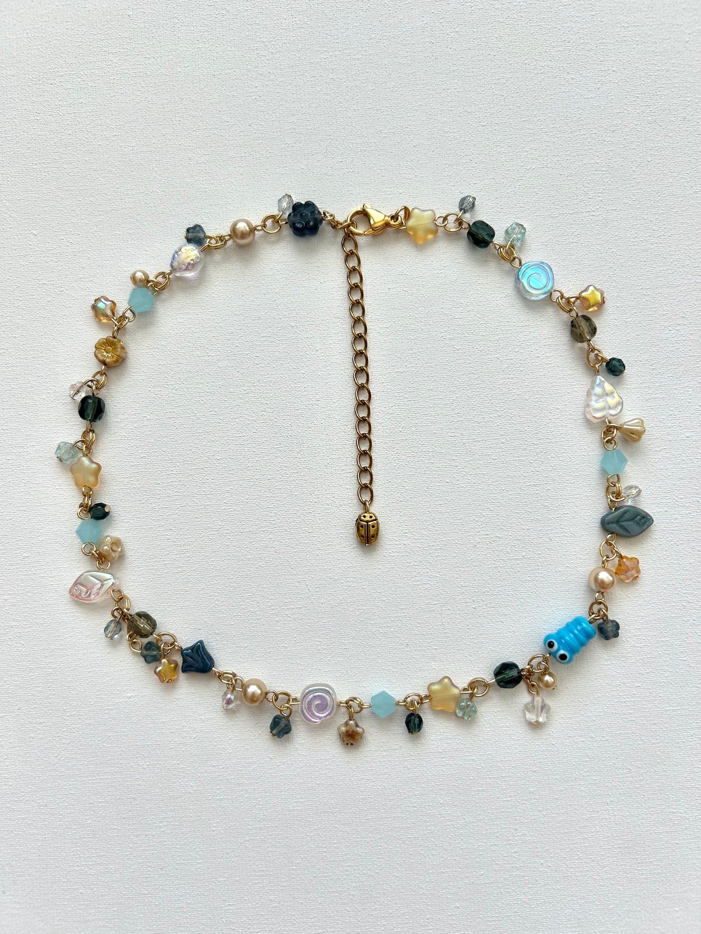 starry night worm necklace