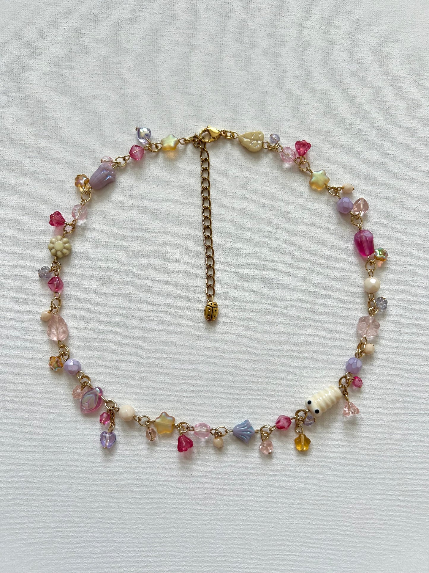 cosmic worm necklace